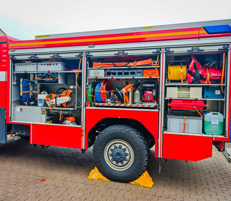 Fire truck equipped with various rescue tools - a hydraulic press, air bags, crowbars, electric...