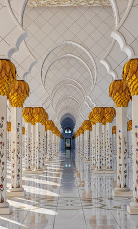 Sheikh Zayed Grand Mosque in Abu Dhabi, United Arab Emirates. One of largest mosques in the world. White marble domes and columnsの写真素材