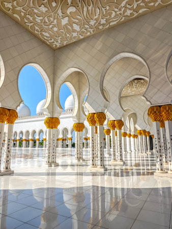 Sheikh Zayed Grand Mosque in Abu Dhabi, United Arab Emirates. One of largest mosques in the world. White marble domes and columnsの写真素材
