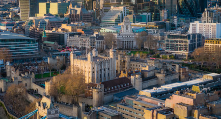 Tower of London. Aerial view drone photo of castle of London between Thames river and London city....