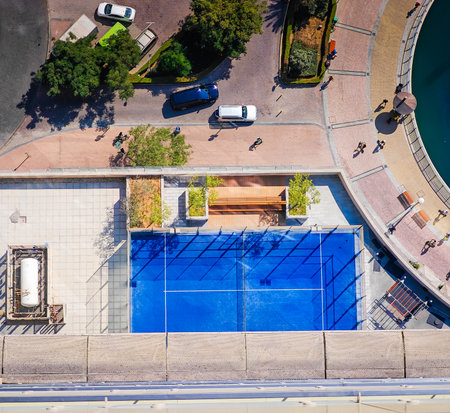 Padel court from above. Aerial view of padel tennis court from balcony of skyscraperの写真素材