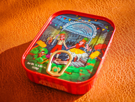 02 18 2026 - Libson, Portugal. Sardines in a can. Colorful can with sardines with pepper in oil. Canned sprats close up photo. Healthy meal concept.のeditorial素材