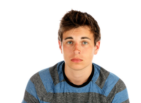 Portrait of teenage boy on white background 