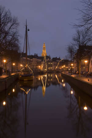 city harbour at night showing great reflections in the waterの写真素材