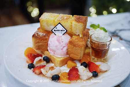 Honey toast with strawberry ice cream and mixed fruits