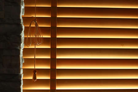 Window blind with natural light from outsideの写真素材