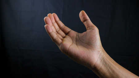 Human hand in choosing gesture isolate on white background with clipping path. Hand symbol reaching...