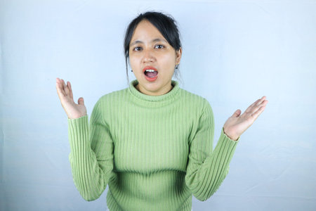 Surprised happy beauty asian woman looking camera in excitement with mouth open facial expression