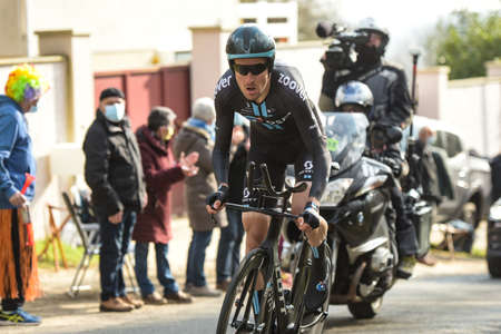 GIEN - FRANCE - 9 MARCH 2021: photography taken on a public street of Andre Greipel during the race paris nice and the time trial of gienのeditorial素材