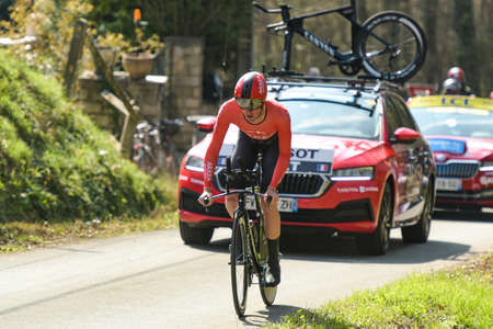 GIEN - FRANCE - 9 MARCH 2021: photography taken on a public street of maxime bouet during the race paris nice and the time trial of gienのeditorial素材