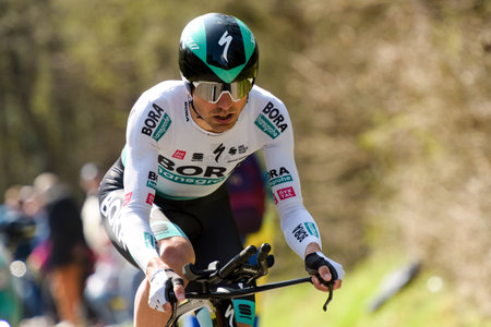 GIEN - FRANCE - 9 MARCH 2021: photography taken on a public street of cesare benedetti during the race paris nice and the time trial of gienのeditorial素材