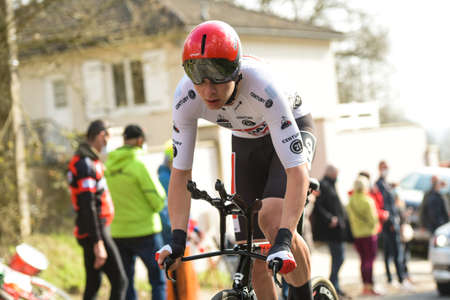 GIEN - FRANCE - 9 MARCH 2021: photography taken on a public street of florian vermeersch during the race paris nice and the time trial of gienのeditorial素材