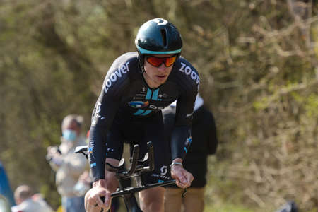 GIEN - FRANCE - 9 MARCH 2021: photography taken on a public street of jasha sutterlin during the race paris nice and the time trial of gienのeditorial素材