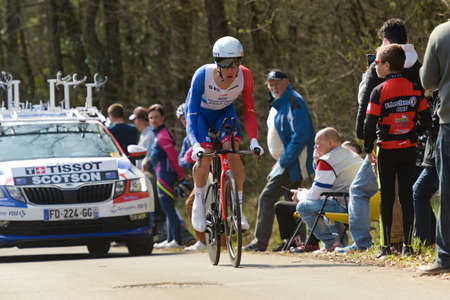 GIEN - FRANCE - 9 MARCH 2021: photography taken on a public street of miles scotson during the race paris nice and the time trial of gienのeditorial素材