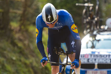 GIEN - FRANCE - 9 MARCH 2021: photography taken on a public street of tim declercq during the race paris nice and the time trial of gienのeditorial素材