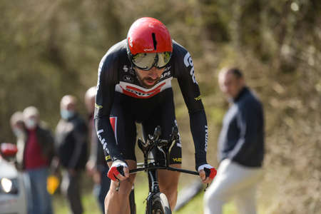 GIEN - FRANCE - 9 MARCH 2021: photography taken on a public street of thomas de gendt in the race paris nice and the time trial of gienのeditorial素材