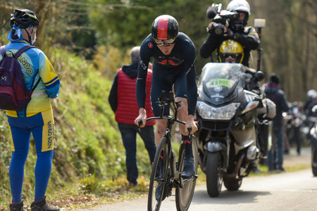 GIEN - FRANCE - 9 MARCH 2021: photography taken on a public street of tao geoghegan hart in the race paris nice and the time trial of gienのeditorial素材