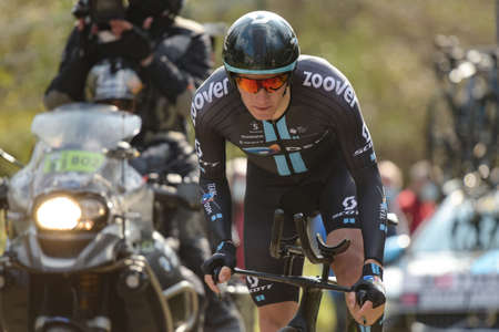 GIEN - FRANCE - 9 MARCH 2021: photography taken on a public street of soren kragh andersen in the race paris nice and the time trial of gienのeditorial素材