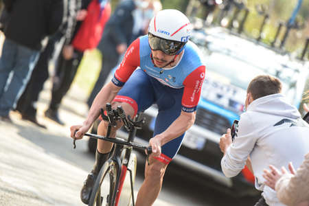 GIEN - FRANCE - 9 MARCH 2021: photography taken on a public street of anthony turgis in the race paris nice and the time trial of gienのeditorial素材