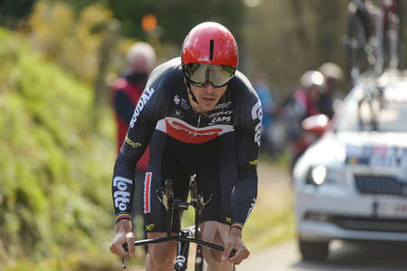 GIEN - FRANCE - 9 MARCH 2021: photography taken on a public street of philippe gilbert in the race paris nice and the time trial of gienのeditorial素材