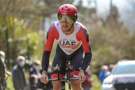 GIEN - FRANCE - 9 MARCH 2021: photography taken on a public street of matteo trentin in the race paris nice and the time trial of gienのeditorial素材