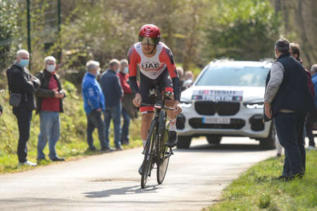 GIEN - FRANCE - 9 MARCH 2021: photography taken on a public street of matteo trentin in the race paris nice and the time trial of gienのeditorial素材