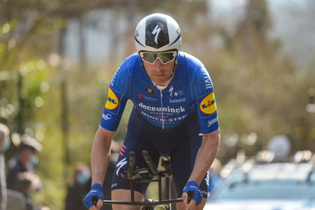 GIEN - FRANCE - 9 MARCH 2021: photography taken on a public street of michael morkov in the race paris nice and the time trial of gienのeditorial素材