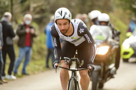 GIEN - FRANCE - 9 MARCH 2021: photography taken on a public street of victor campenaerts in the race paris nice and the time trial of gienのeditorial素材