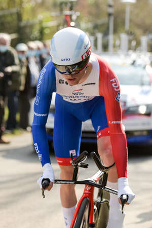 GIEN - FRANCE - 9 MARCH 2021: photography taken on a public street of david gaudu in the race paris nice and the time trial of gienのeditorial素材
