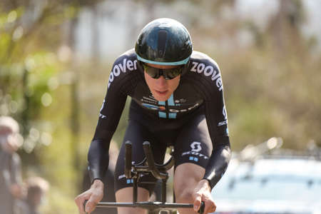 GIEN - FRANCE - 9 MARCH 2021: photography taken on a public street of nils eekhoff in the race paris nice and the time trial of gienのeditorial素材