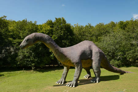 CARDOLAND - FRANCE - AUGUST 2021: statue of dinosaur taken on the park of cardoland in the morvan in franceのeditorial素材