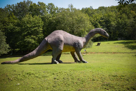 CARDOLAND - FRANCE - AUGUST 2021: statue of dinosaur taken on the park of cardoland in the morvan in franceのeditorial素材
