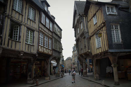 DINAN - FRANCE - SEPTEMBER 2021: old houses in the streets of the medieval city of dinan in brittanyのeditorial素材