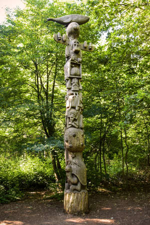 OCTOBER 2021 - VINCENNES - FRANCE: view of a sculpture on a tree trunk in the wood of Vincennes in Franceのeditorial素材