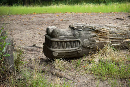 OCTOBER 2021 - VINCENNES - FRANCE: view of a sculpture on a tree trunk in the wood of Vincennes in Franceのeditorial素材