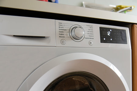 view of a working washing machine at homeの写真素材