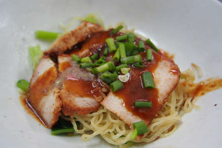 BBQ pork with egg dry noodleの写真素材