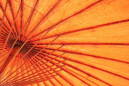 Under Thai traditional umbrellaの写真素材