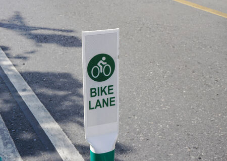 Bike lane signage on street in Bangkokの写真素材