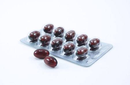 Isolated of brown color rice bran oil supplementary food in the medicine package