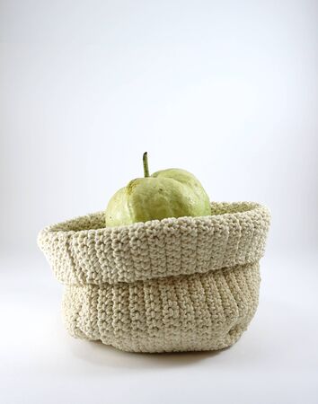 Isolated of Green guava fruit  in a sackの写真素材