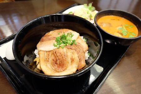 Japanese roasted pork rice serving with spicy soupの写真素材