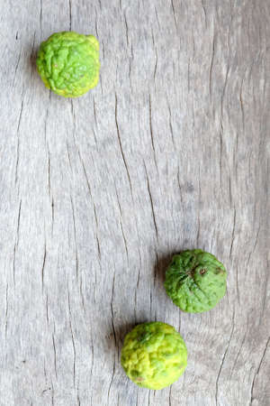 fresh bergamots on the timber backgroundの写真素材