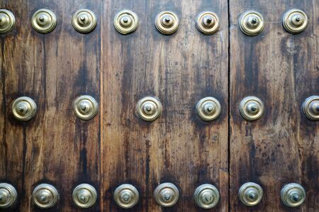 rustic metal ornamnetal decoration on the door panel in Spainの写真素材