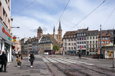 Strasbourg, France - 3 May,2016 : From the train station to beautiful old town of Strasbourg with tram track and people walking on 3 May 2016 in Strasbourg, Franceのeditorial素材