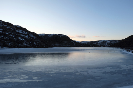 Beautiful landscape of the frozen lake with Tundra arctic in Teriberka , Russiaの写真素材