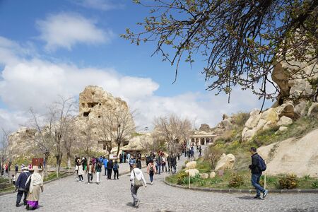 Goreme, Turkey â 19 April, 2019 : People walking around unique beautiful landscape at the open air museum historical landmark of Goreme , Cappadocia â 19 April, 2019 in Goreme, Turkeyのeditorial素材