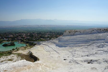 Panoramic view of the beautiful white Travertines terrace of Pamukkale landscape without water in Julyの写真素材