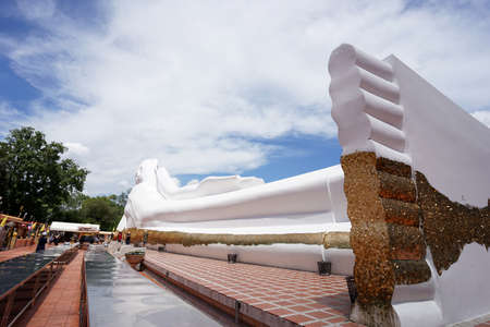 Phra Nakhon Si Ayutthaya , Thailand - 20 June, 2020 : The white large reclining Buddha sculpture outdoor with beautiful sky in Wat Satue 20 June, 2020 in Phra Nakhon Si Ayutthaya , Thailandのeditorial素材