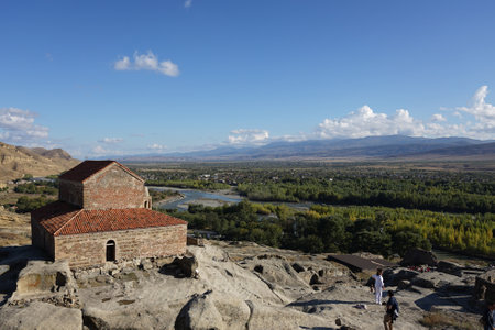 Gori , Georgia â 18 October,2021 : The main church with unique landscape Archaeological site of the Uplistsikhe cave town fortress on the sunny day â 18 October,2022 in Gori , Georgiaのeditorial素材